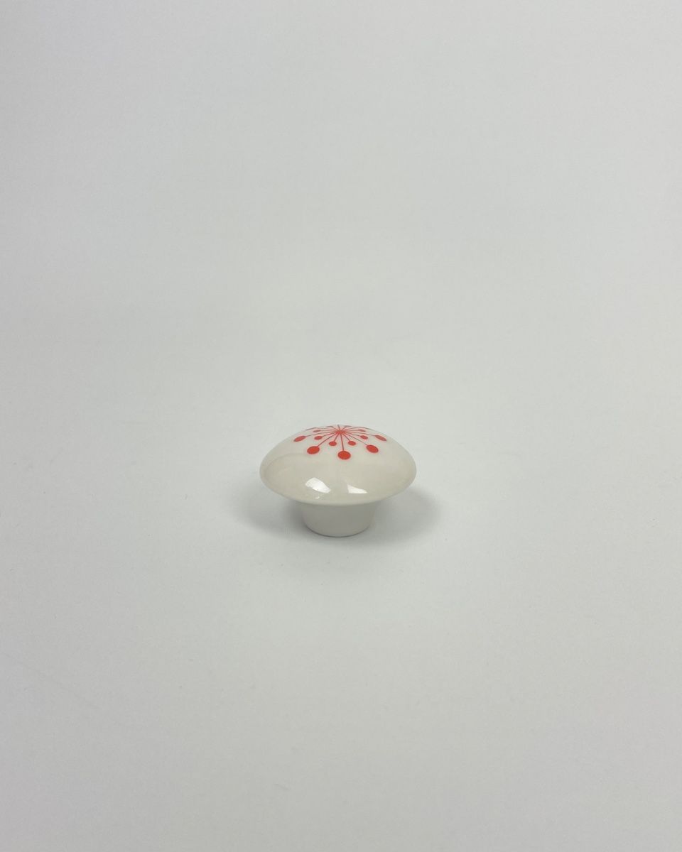 flower porcelain knob, glazed white with a hand-painted flower