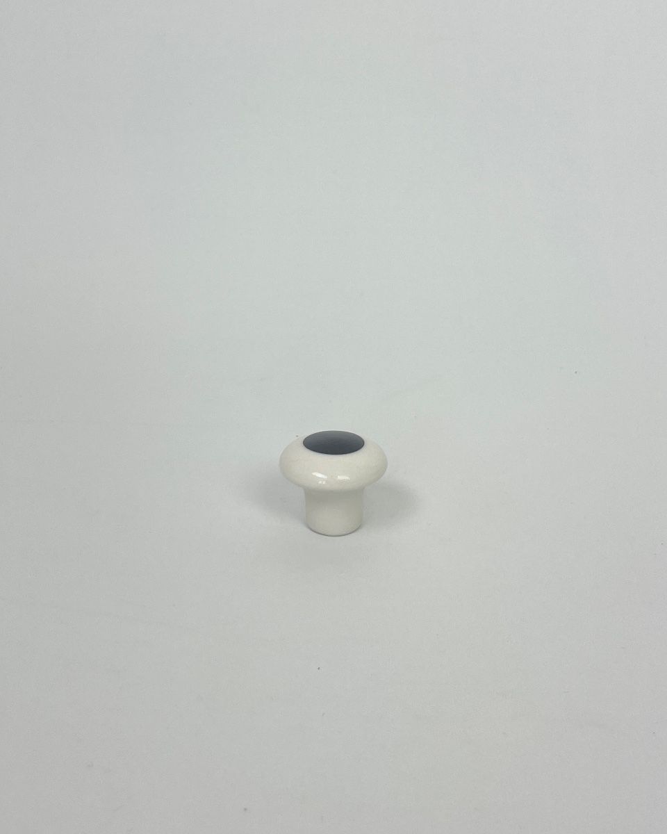 dot porcelain knob, glazed white with a hand-applied dot