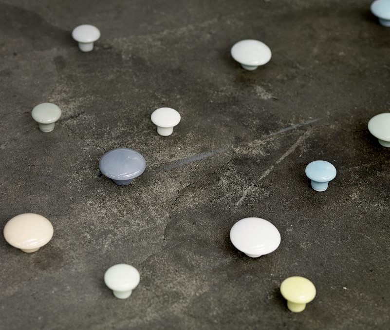 porcelain knobs and wall hooks in several sizes and colours